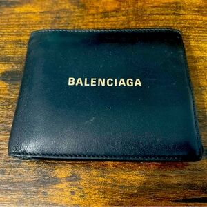 Balenciaga cash square folded men’s wallet. Made of calfskin. Retails at $375.
